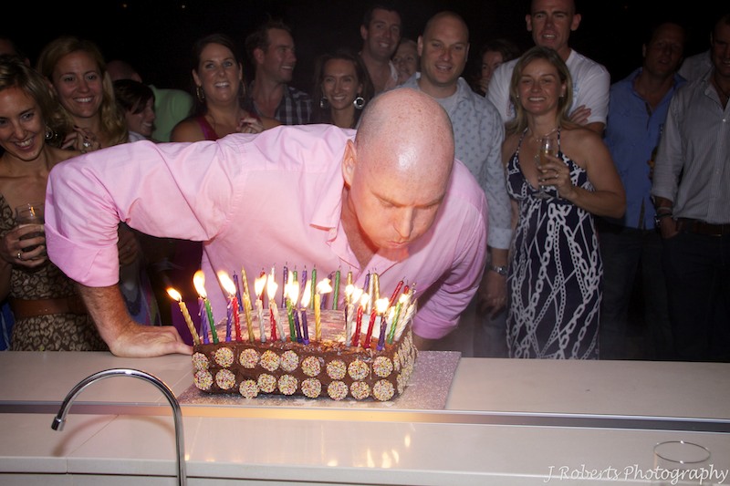 blowing out candles - party photography sydney